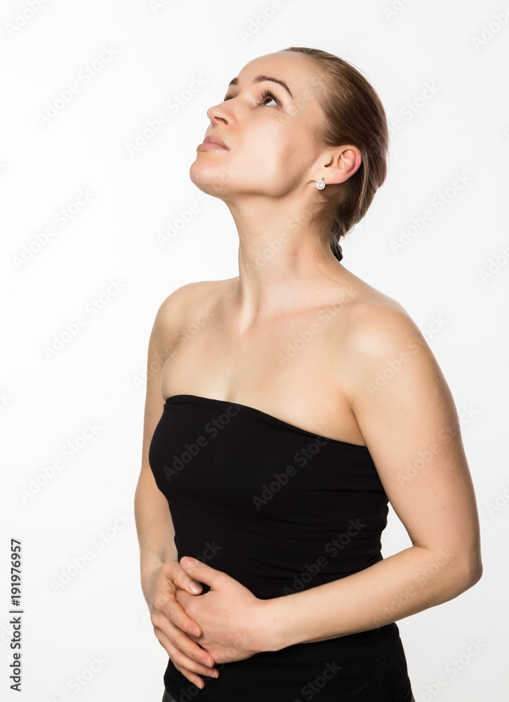 gymnastics for a face, woman doing anti-aging exercises. beauty and health concept