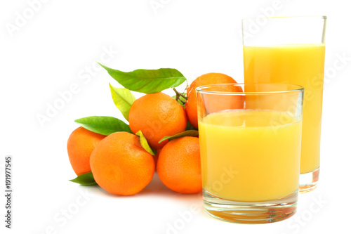 Handful of mandarines and orange juice