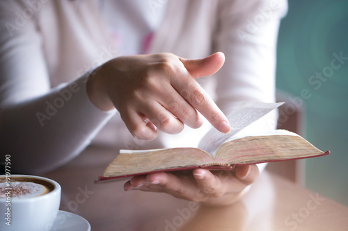 Women reading the Holy Bible. Reading a book.