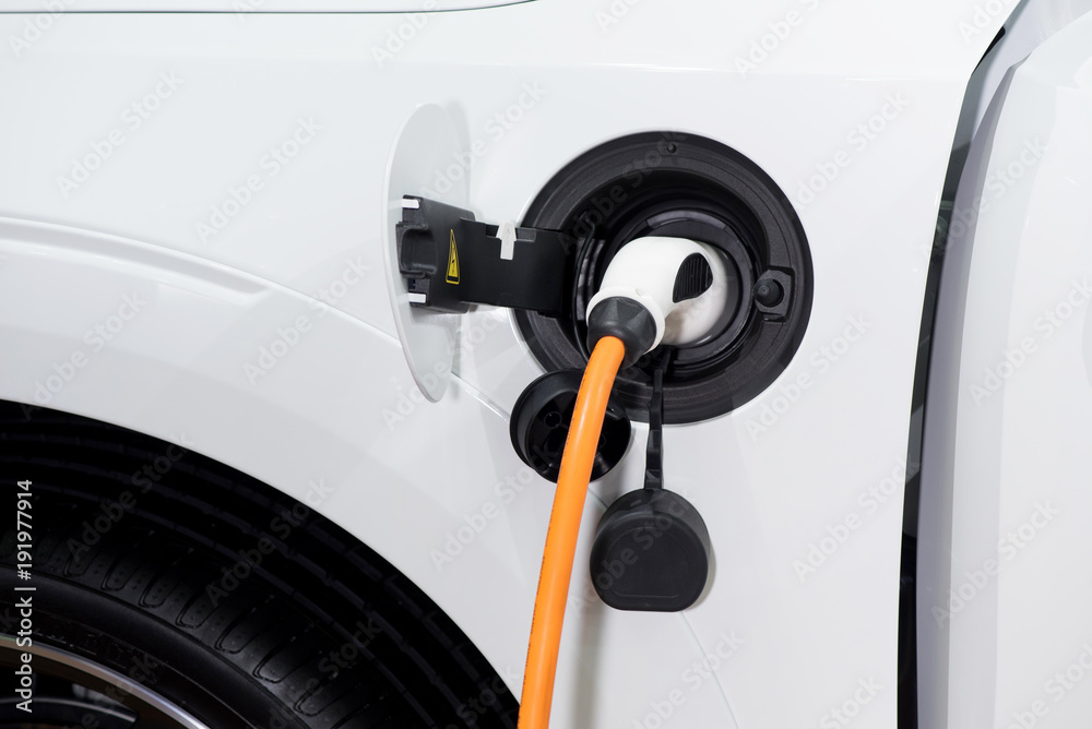 Power supply plugged charging electric hybrid car  technology industry transport