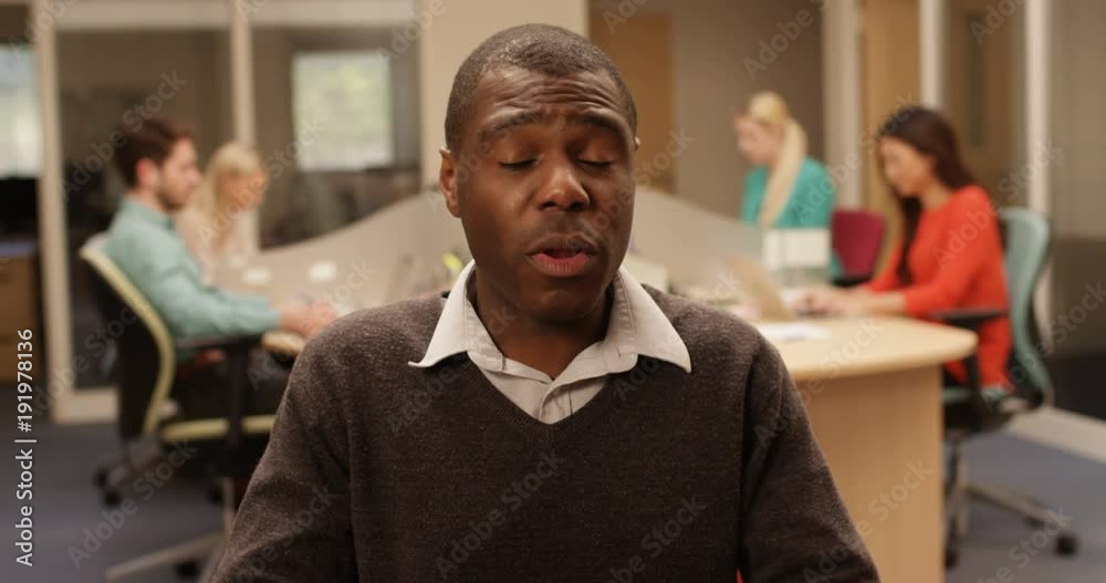 4K Businessman having a serious conversation via video call in the office