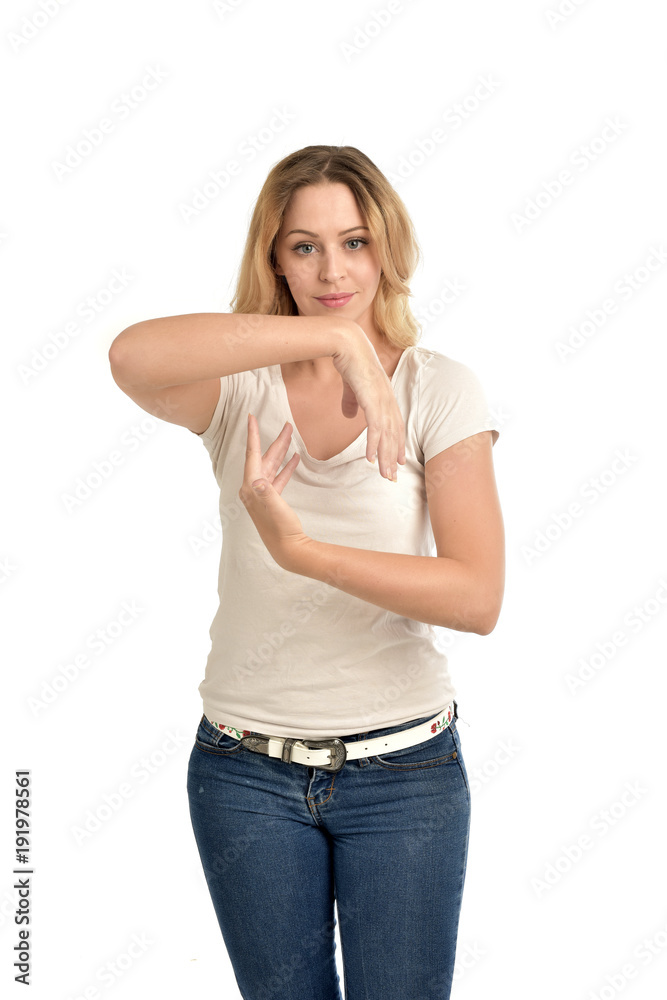 3/4 portrait of blonde girl wearing white shirt. isolated on white background. 3/4 portrait of blonde girl wearing white shirt. isolated on white background.
