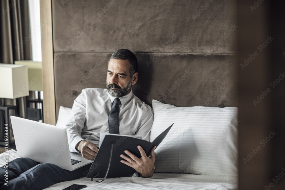Businessman Working at Hotel Room
