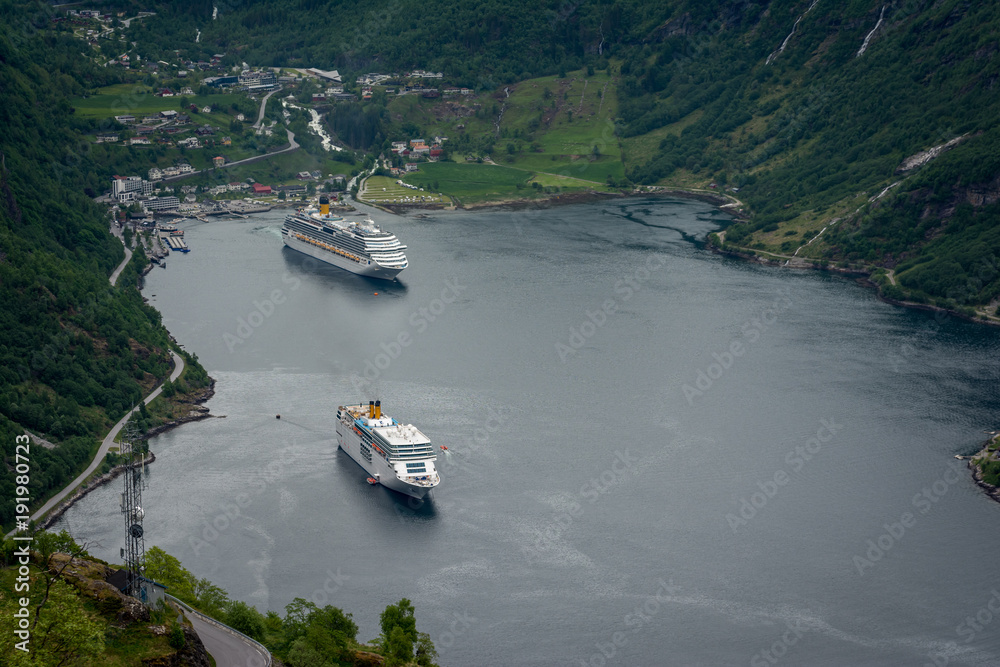 Beautiful Geiranger Fjord from Norway, this is a very touristic place, everyday dozens of boats coming and leaving.