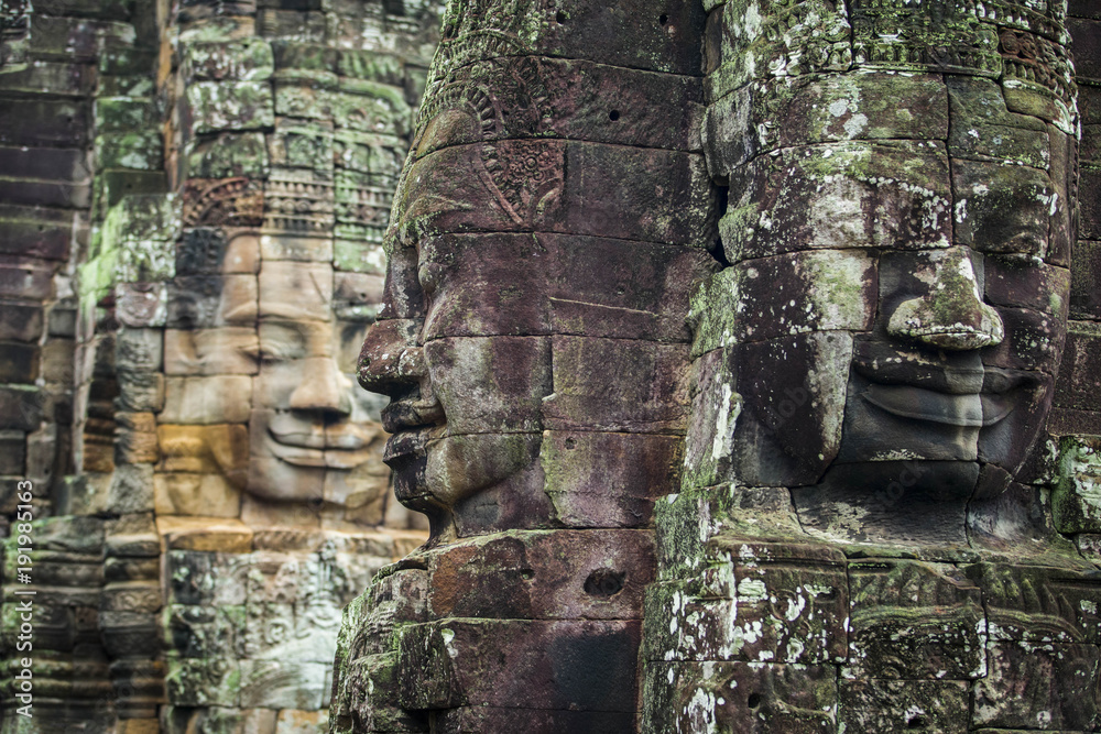 Bayon Temple Angkor Thom, The serenity of the stone faces Cambodia. Huge sculptures of faces in the archaeological site of Angkor Thom. Face-towers depicting Bodhisattva Avalokiteshvara
