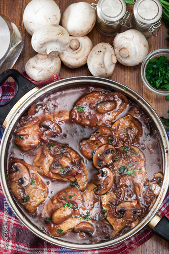 Delicious chicken marsala on frying pan