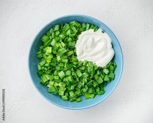 Sliced green onions or scallions in a bowl