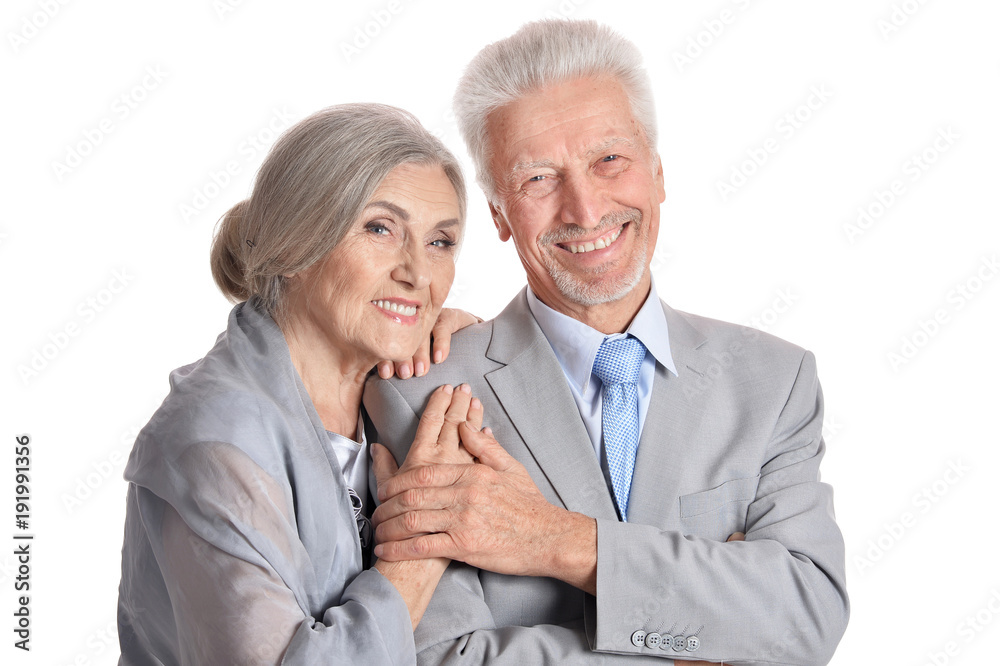 hugging senior couple on white background hugging senior couple on white background