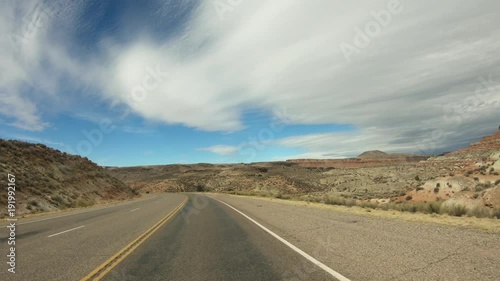 Wallpaper Mural Southwest Utah desert highway hills traffic POV. Near St George. Geological landscape beautiful dry mountain valley. Driving point of view, POV Torontodigital.ca