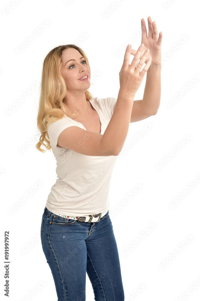3/4 portrait of blonde girl wearing white shirt. isolated on white background. 3/4 portrait of blonde girl wearing white shirt. isolated on white background.