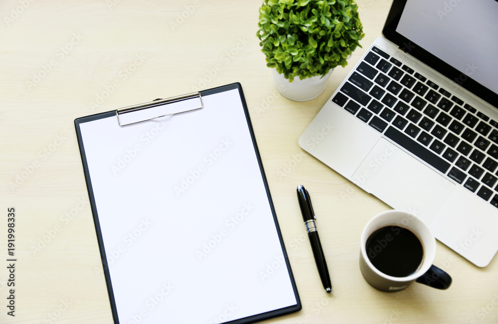blank paper on the desk businessman with Laptop Coffee Pen Copy space,Top view blank paper on the desk businessman with Laptop Coffee Pen Copy space,Top view
