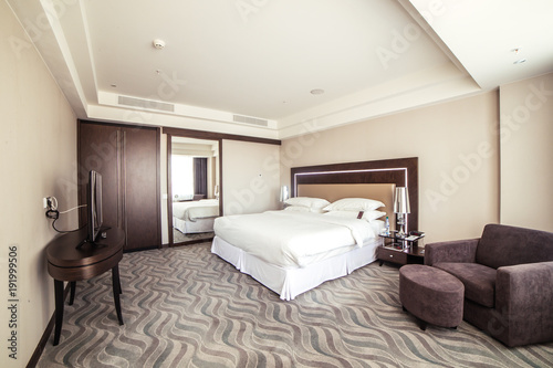 photo of interior design of luxury hotel bedroom