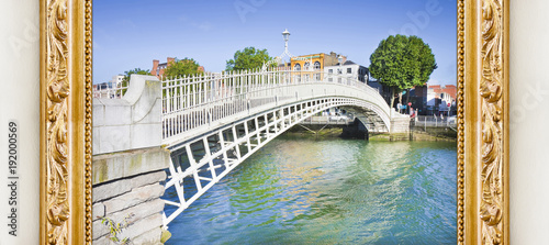 Fotografie, Obraz The most famous bridge in Dublin called Half penny bridge concept image with a