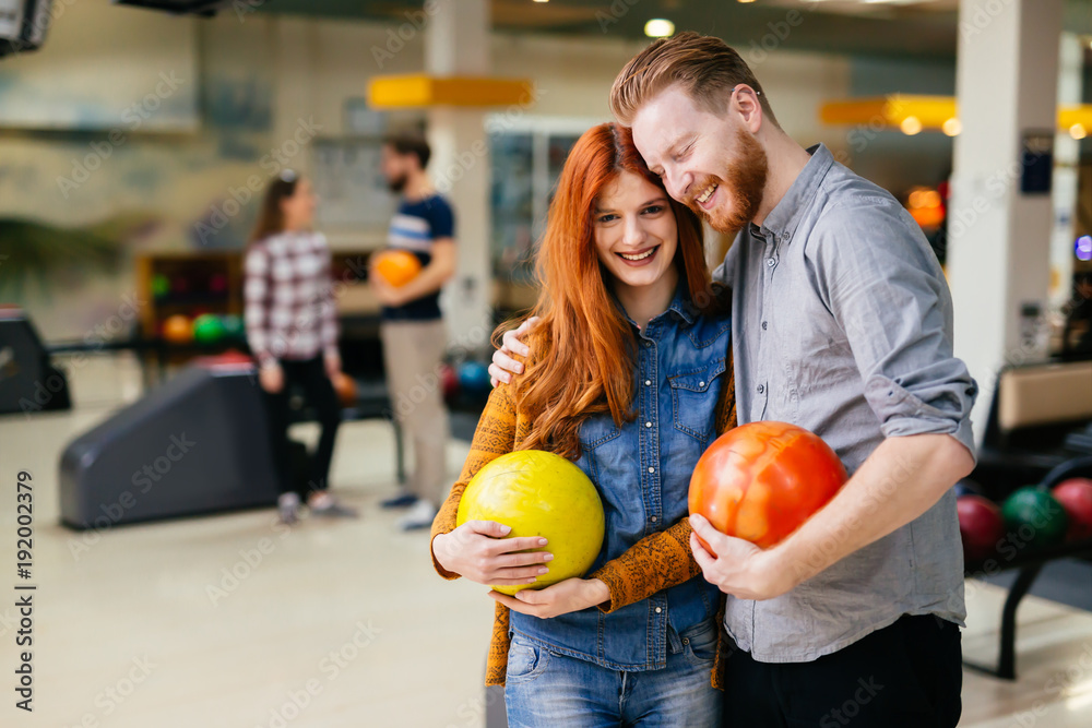 Fototapeta premium Beautiful couple dating and bowling