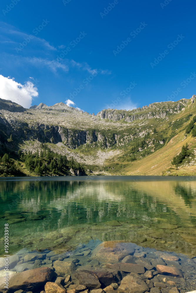 Camp Lake (Lago di Campo). With the peak of Re di Castello - Trento Italy