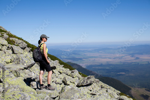 Hiker enjoying view at top, Star_ Smokovec, Presov, Slovak Republic photo