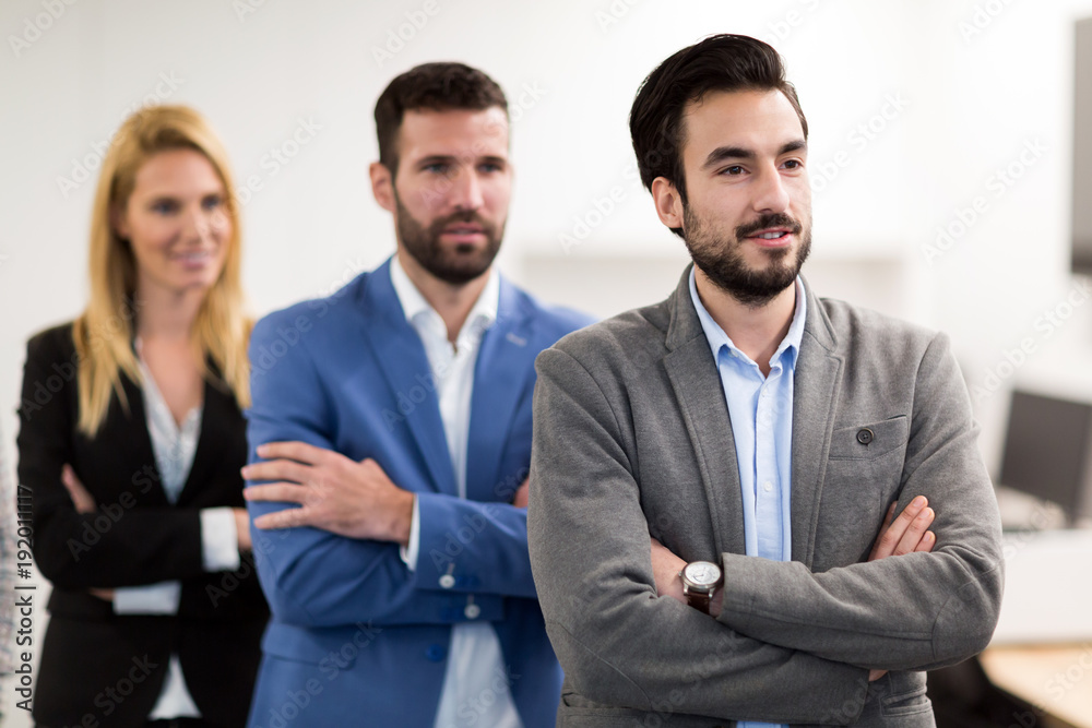Portrait of business team posing in office Portrait of business team posing in office