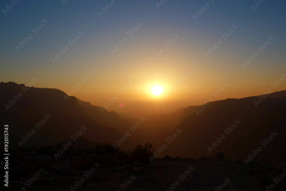 Sunset at Canyon of Dana Biosphere Nature Reserve landscape near Dana historical village, Jordan, Middle East