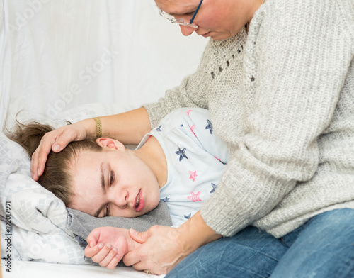 A child with epilepsy during a seizure photo