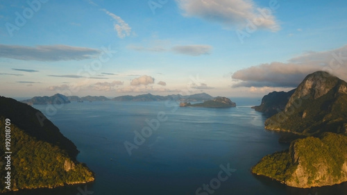 Tropical bay in El Nido. Aerial view: bay and the tropical islands. Tropical landscape. Sky and mountains rocks. Seascape:sky, mountains, ocean.Philippines, El Nido. Travel concept