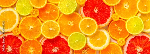Panel kuchenny z motywem beautiful fresh sliced mixed citrus fruits like background, concept of healthy eating, dieting, top view