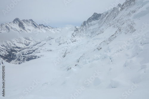 View on the peak of the biggest glacier of jungfrau. Bernese Oberland, Switzerland. Swiss Alps