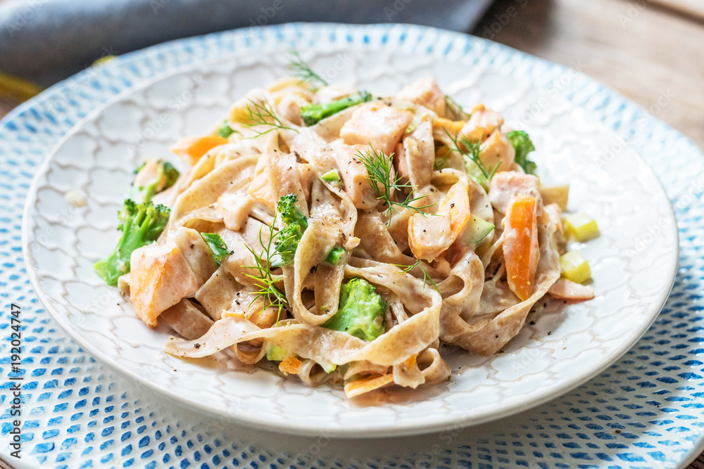 Pasta with salmon in a creamy sauce Pasta with salmon in a creamy sauce