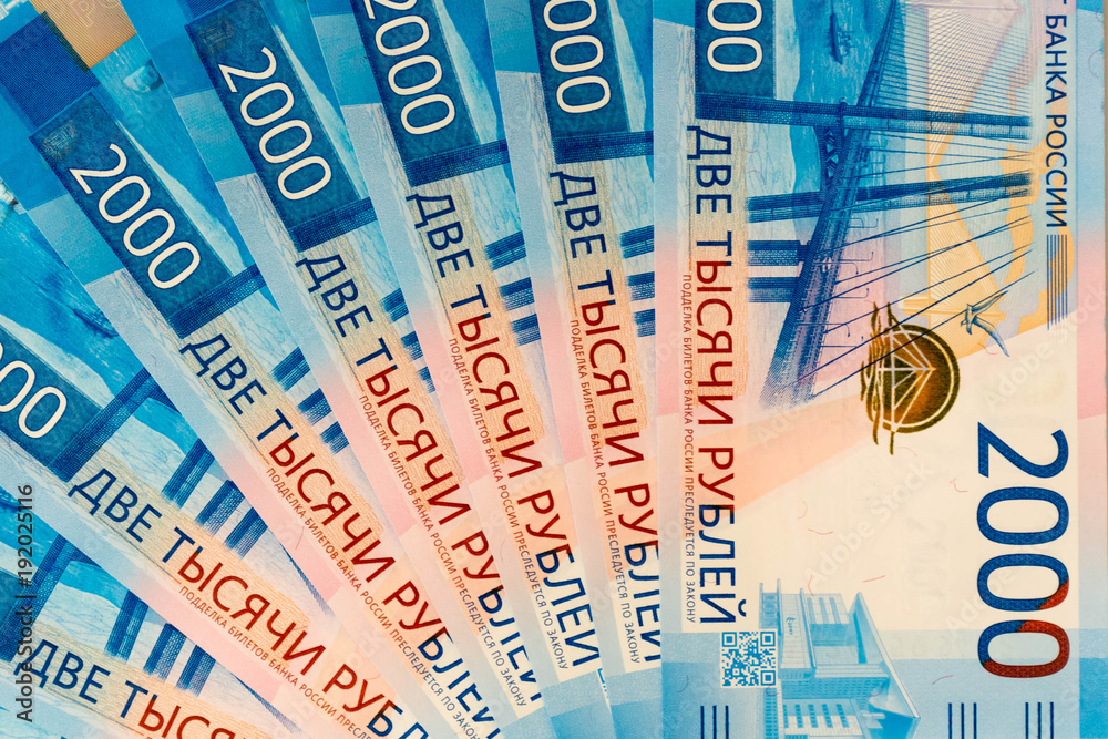 background of the new banknotes worth 2000 rubles background of the new banknotes worth 2000 rubles