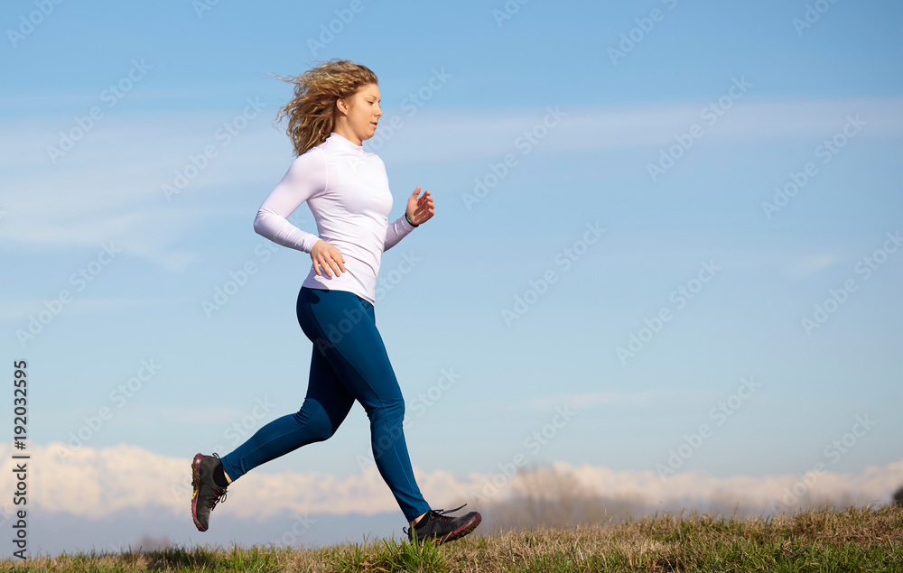 running woman in country environment
