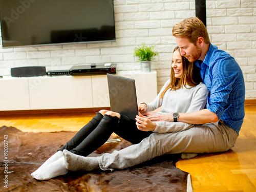 Loving couple sitting on th...