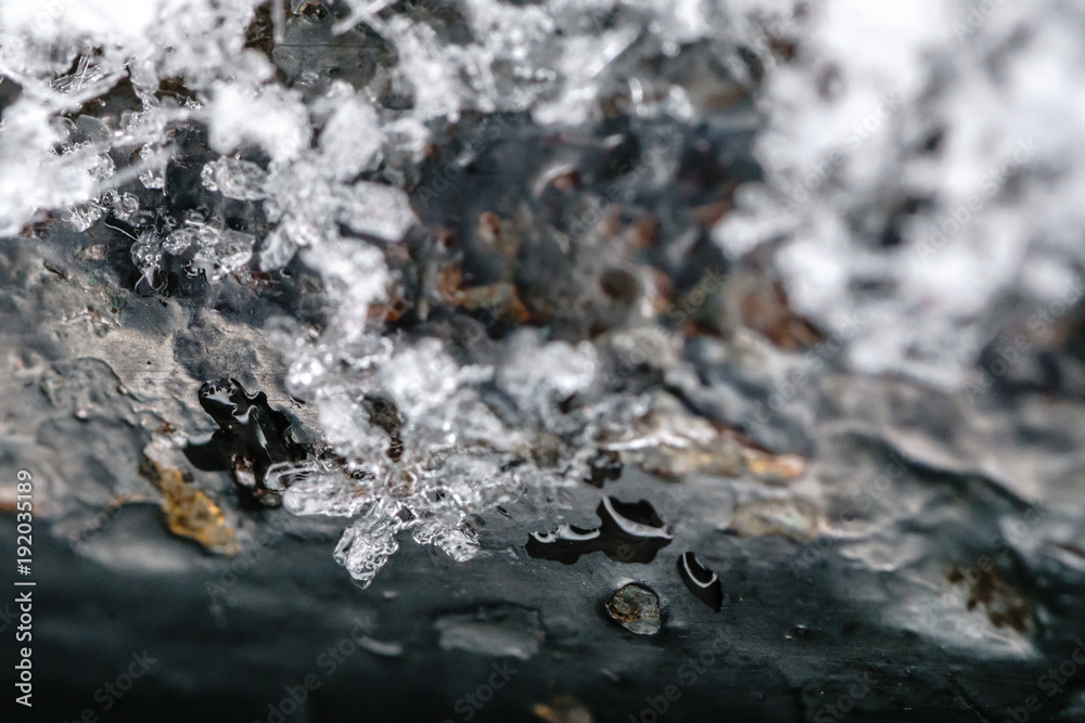 Macro photography of snowflake taken in paris during snowfall in Paris. A snowflake is a single ice crystal. looks like ice but very small and very light. it has many shape and used as snow symbols Macro photography of snowflake taken in paris during snowfall in Paris. A snowflake is a single ice crystal. looks like ice but very small and very light. it has many shape and used as snow symbols