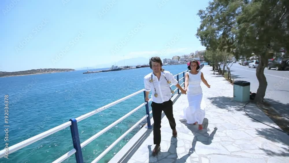 photosession of newlyweds on the background of the sea. Greece. photosession of newlyweds on the background of the sea. Greece.
