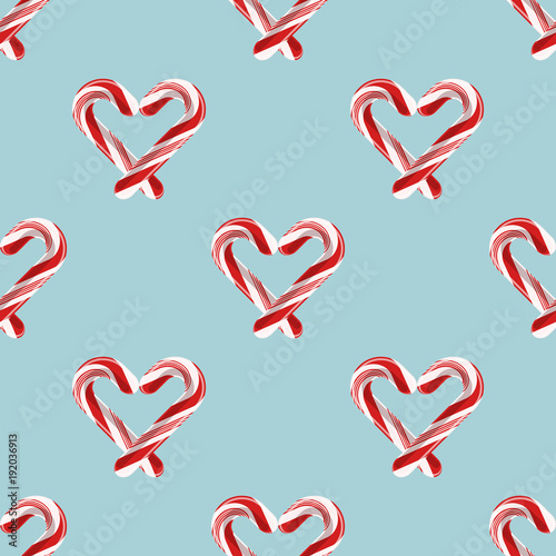 Seamless pattern with candy cane lollypops