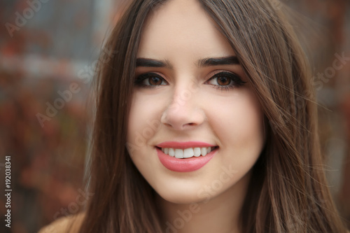 Beautiful smiling woman out...