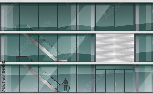 The facade is a modern shopping centre or train station, airport, school or library. Public city building.