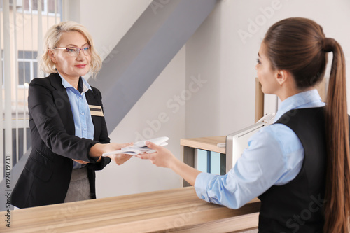 Female receptionist teachin...