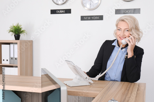 Female receptionist talking...
