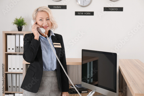 Female receptionist talking...