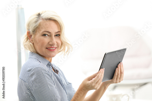 Mature woman with hearing a...