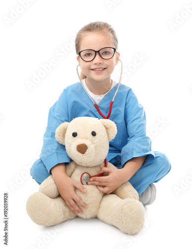 Cute little girl in doctor ...