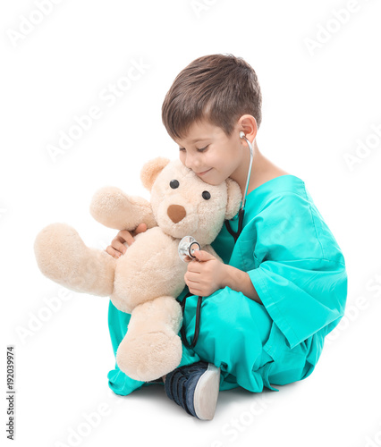 Cute little boy in doctor u...
