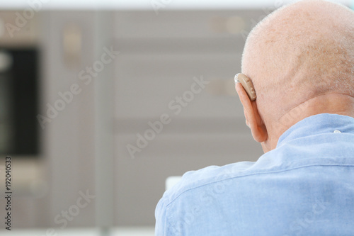 Hearing impaired man at home