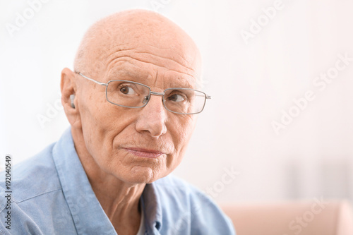Hearing impaired man at home