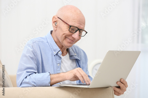 Hearing impaired man workin...