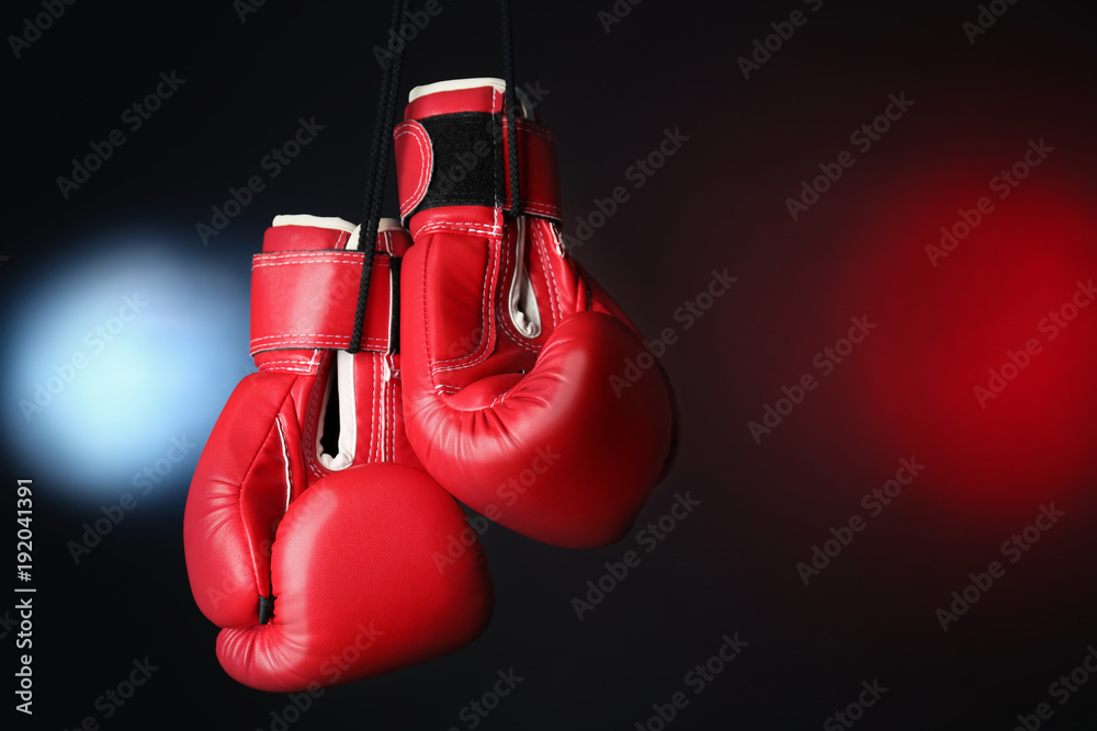 Boxing gloves on dark background