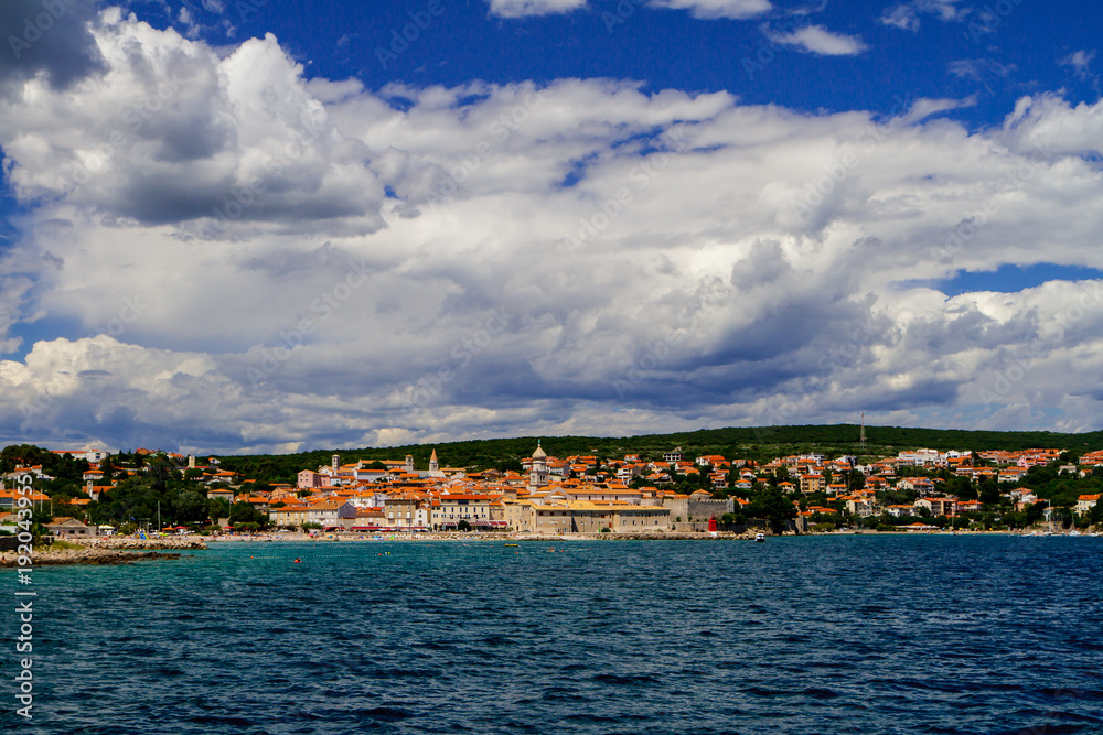 Adriatic sea, city, sky with clouds in Croatia