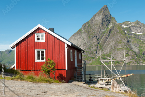 Traditional building in coast landscape on Lofoten islands in northern Norway. Lofoten is a popular tourist destination.