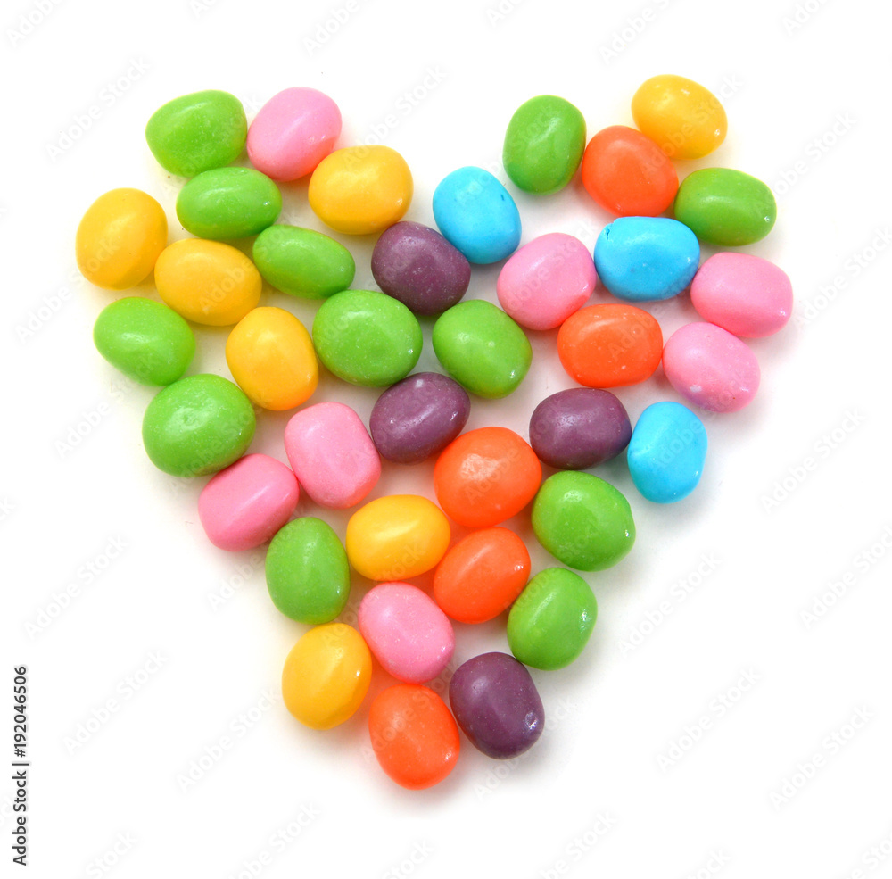 Colorful, mixed jelly beans on white background Colorful, mixed jelly beans on white background