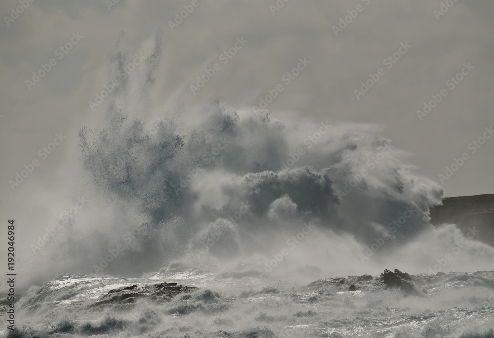 Big wave breaking against the rocks, coast of Gran canaria, Canary islands