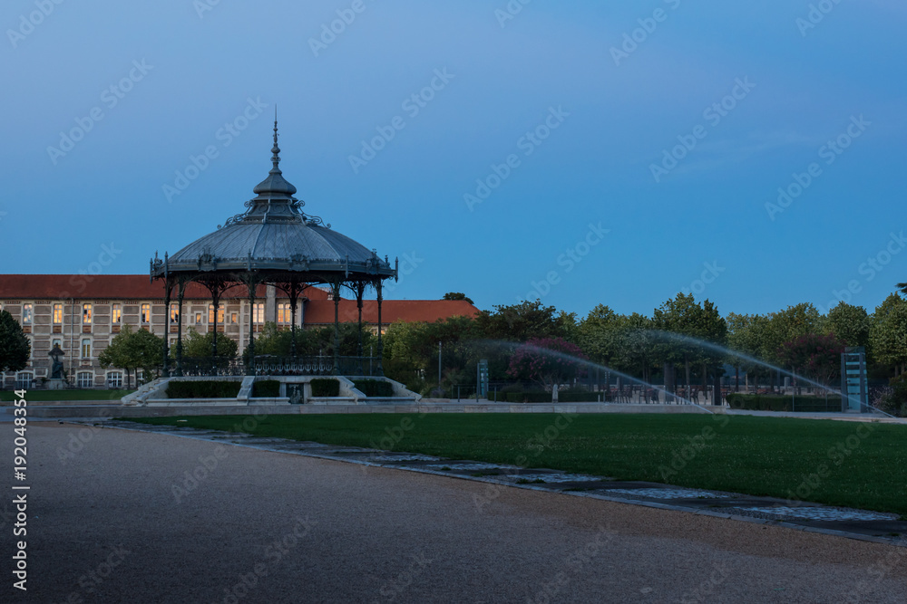 Bandstand kiosk Peynet in the middle of the Champs de Mars avenue in Valence during the sunrise.